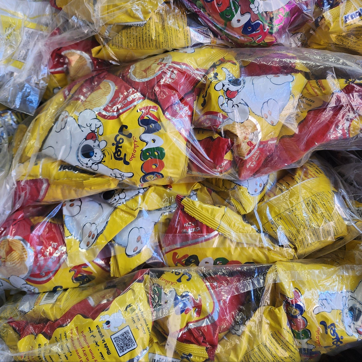 Pile of colorful snack packages with cartoon characters