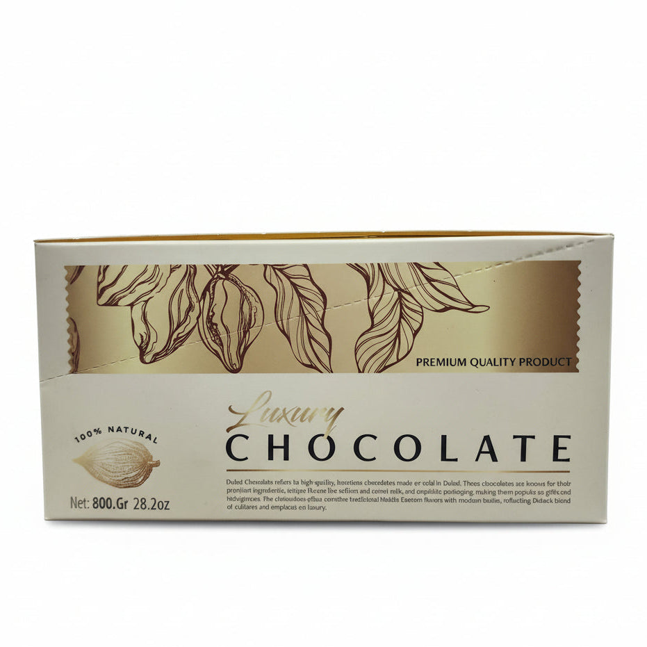 Box of luxury chocolate with a blurred store shelf in the background