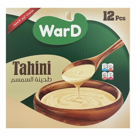 Box of WarD Tahini with a wooden spoon and bowl on a green background