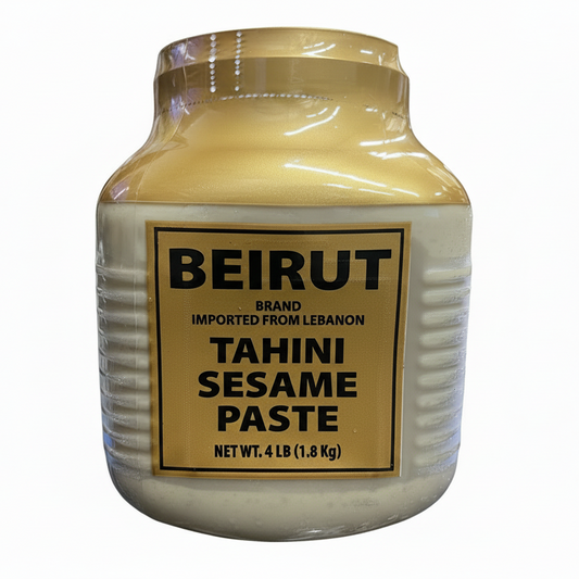 A plastic jar of Beirut brand Tahini Sesame Paste, 4 lbs in weight, with a predominantly white label and a gold accent.