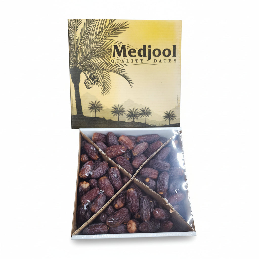 Box of Medjool dates with a palm tree design on a metal surface.