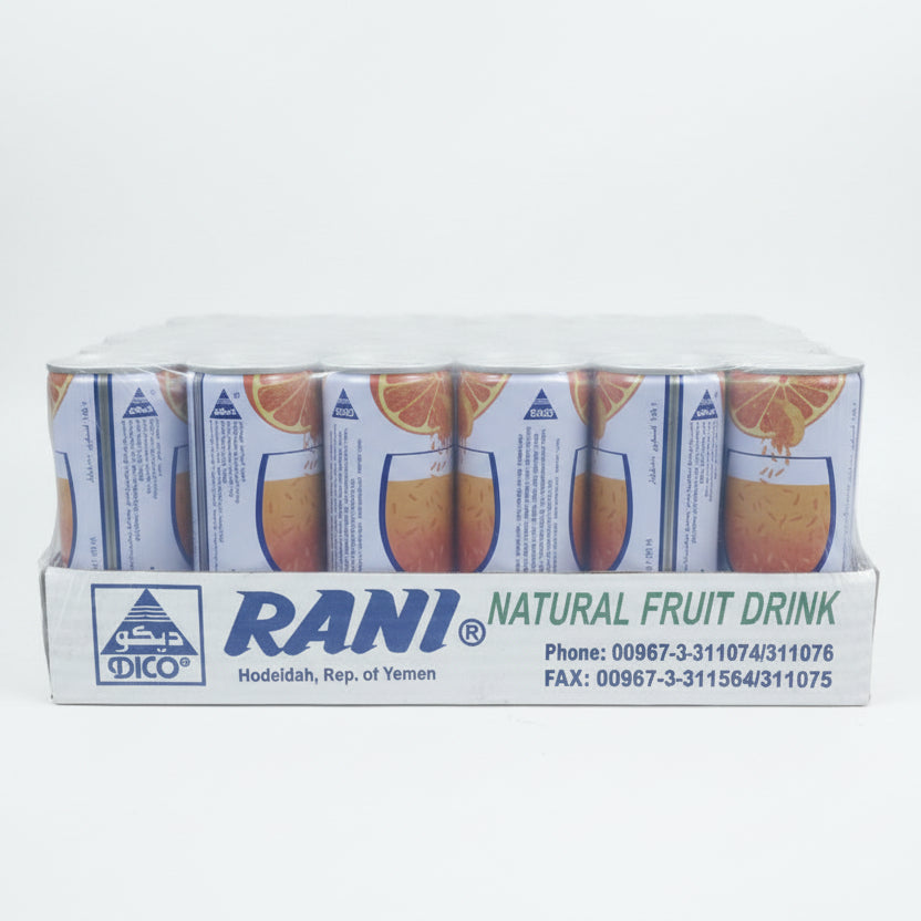 Packs of Rani natural fruit drink among cardboard boxes