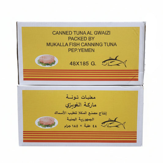 Canned tuna packaging with yellow and red design on a blurred background