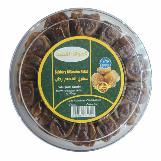 Packaged dates with a green label on a metal shelf