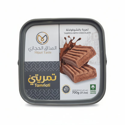 Container of Tamhaki chocolate cookies with Arabic text on a white surface