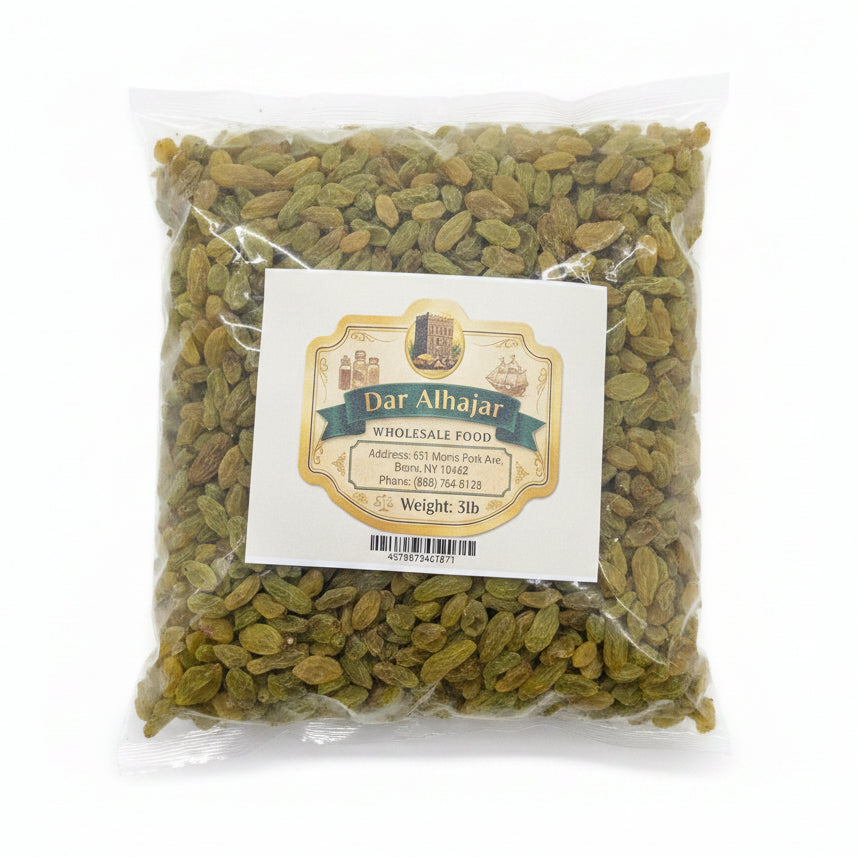 Packaged green raisins with a label on a white surface