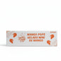 Box of Mango Pops ice cream with a fan and white wall in the background