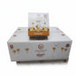 Product packaging with brand logo in a warehouse setting