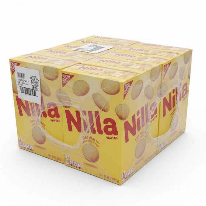 Stack of Nilla wafers boxes in a cardboard box with various other items.
