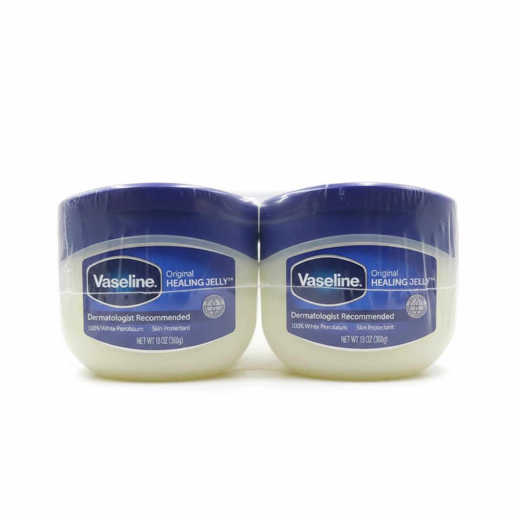 Two containers of Vaseline lip balm in a store setting