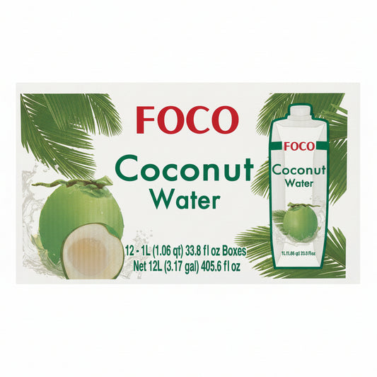 A 12-count box of FOCO Coconut Water displayed on a store shelf, with other grocery boxes in the blurred background.